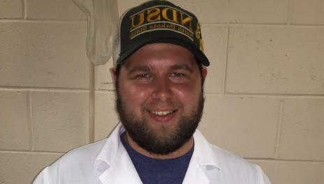 Alumni Hulst in Lab Coat headshot